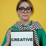 Cleaning professional wiping kitchen counter with cloth