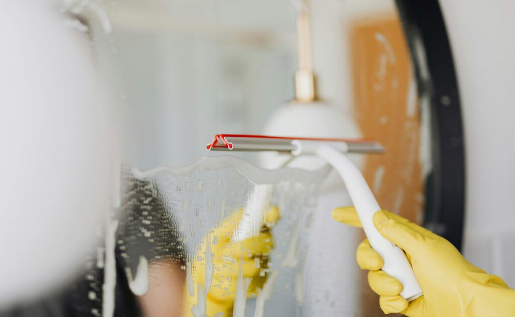 Cleaning tools and supplies on table